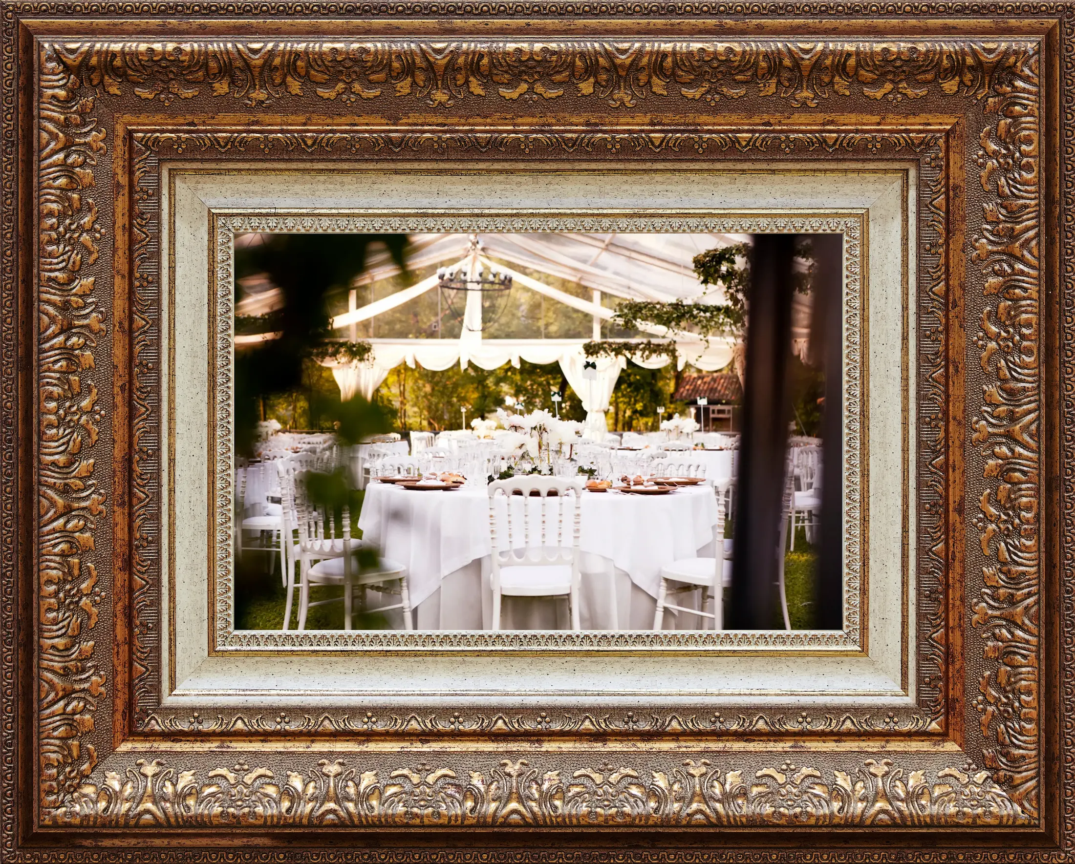 Image of decorated chairs and tables in a marquee